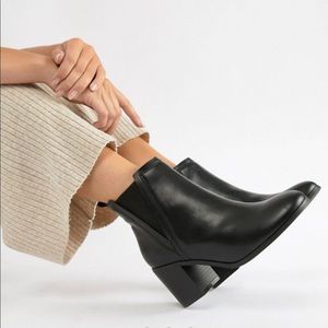 Black Chelsea boots